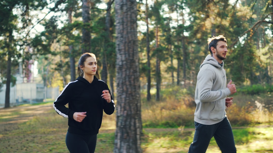 Woman jogging outdoors in morning light