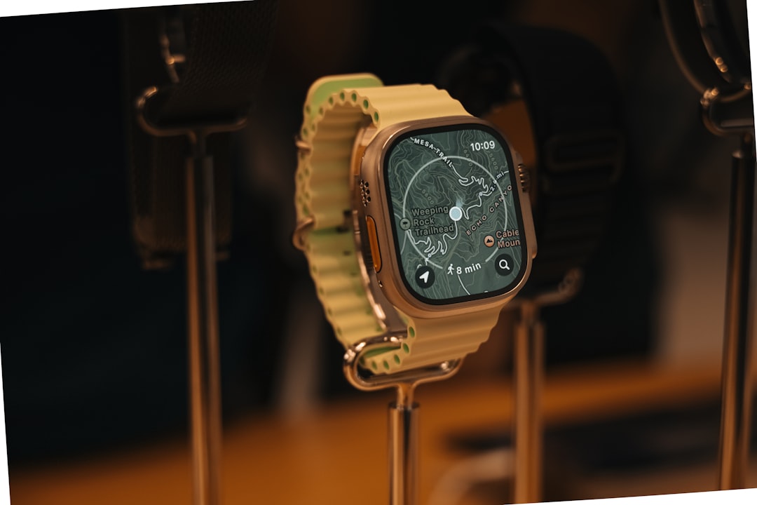 Digital fitness watch displaying activity tracking metrics