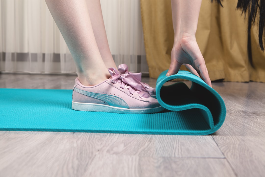 woman doing morning stretches on yoga mat