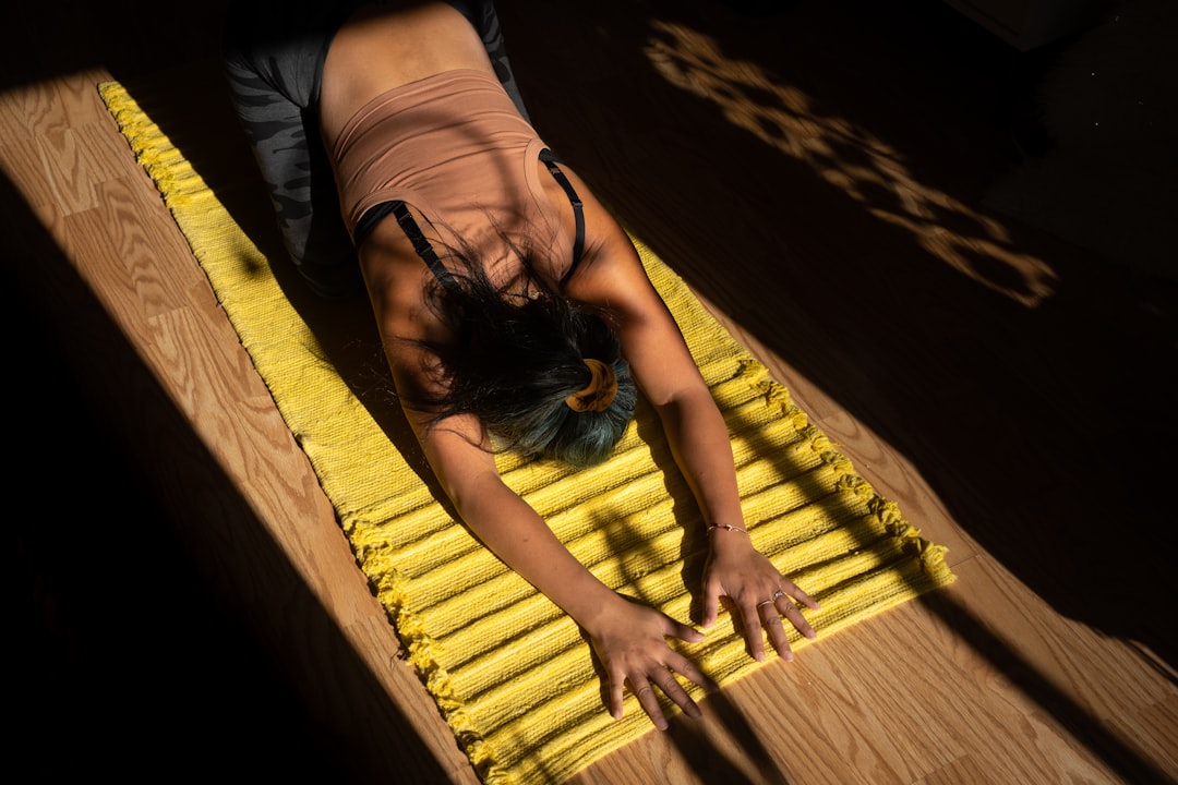 Hot yoga studio with rows of yoga mats