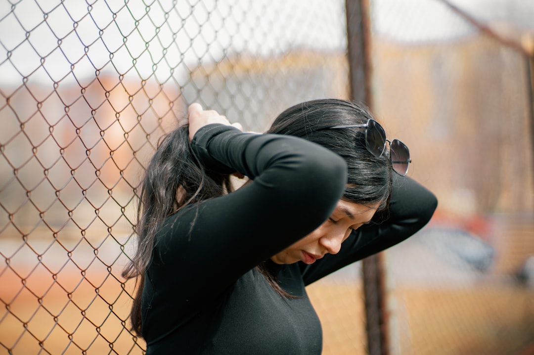 Woman looking frustrated with fitness tracker