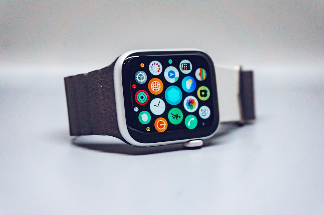 Smart fitness watch on wrist displaying health metrics