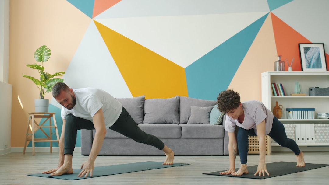 Bright living room with yoga mat and fitness setup
