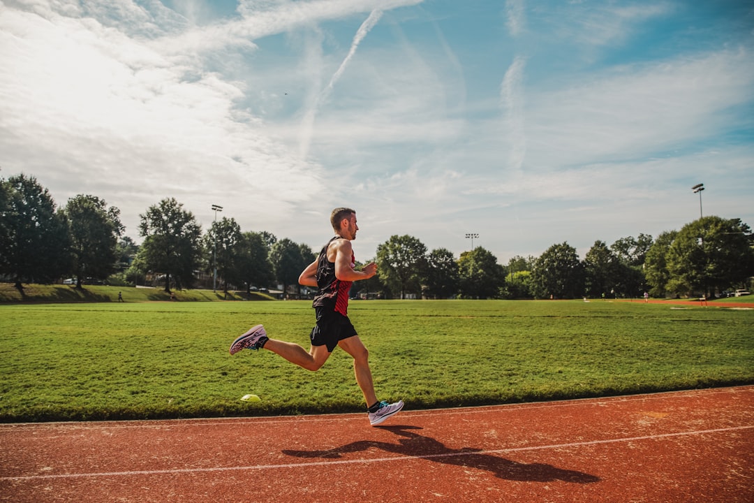 athlete sweating during intense running exercise