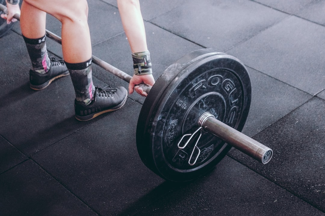 Woman doing strength training exercises at home