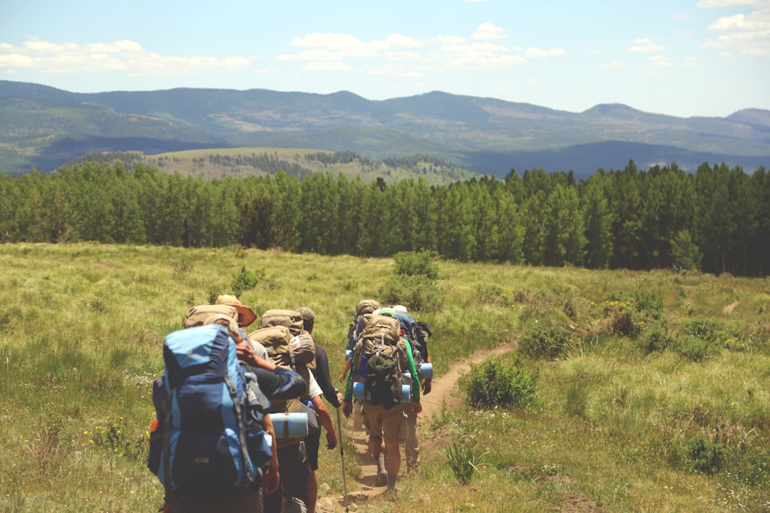 Rucking on a scenic trail with weighted backpack
