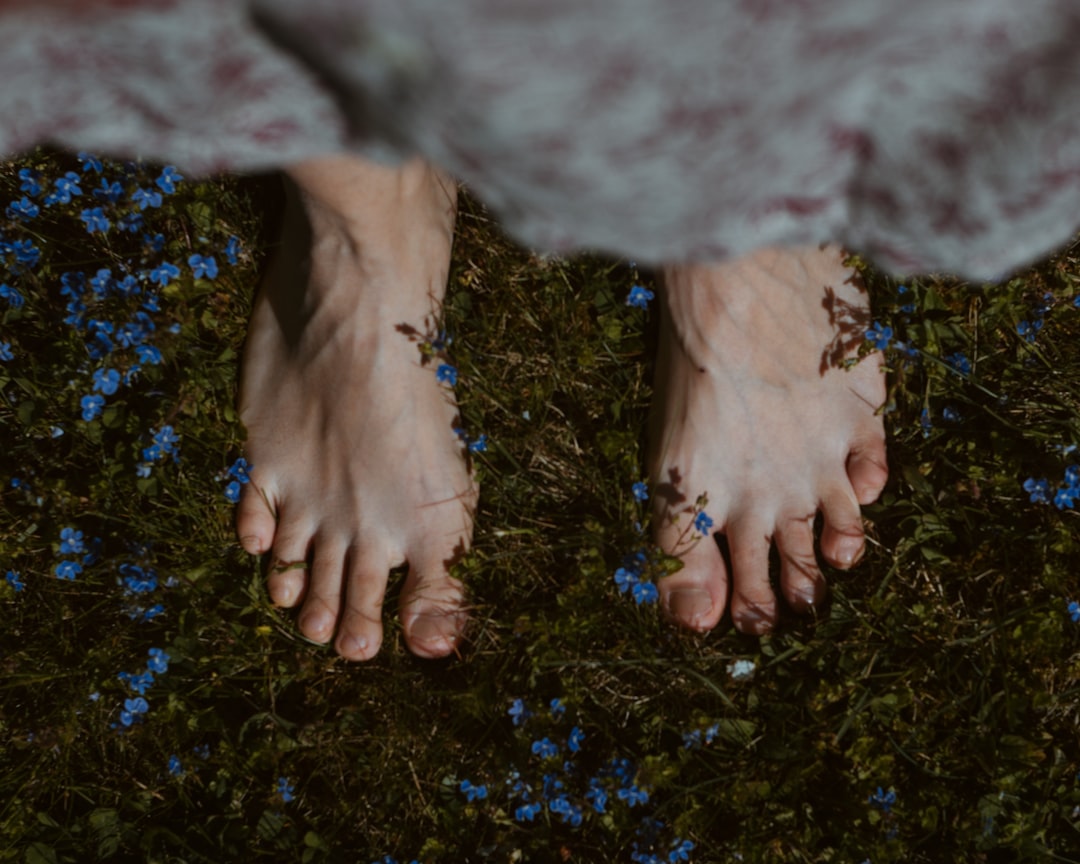 barefoot walking on grass