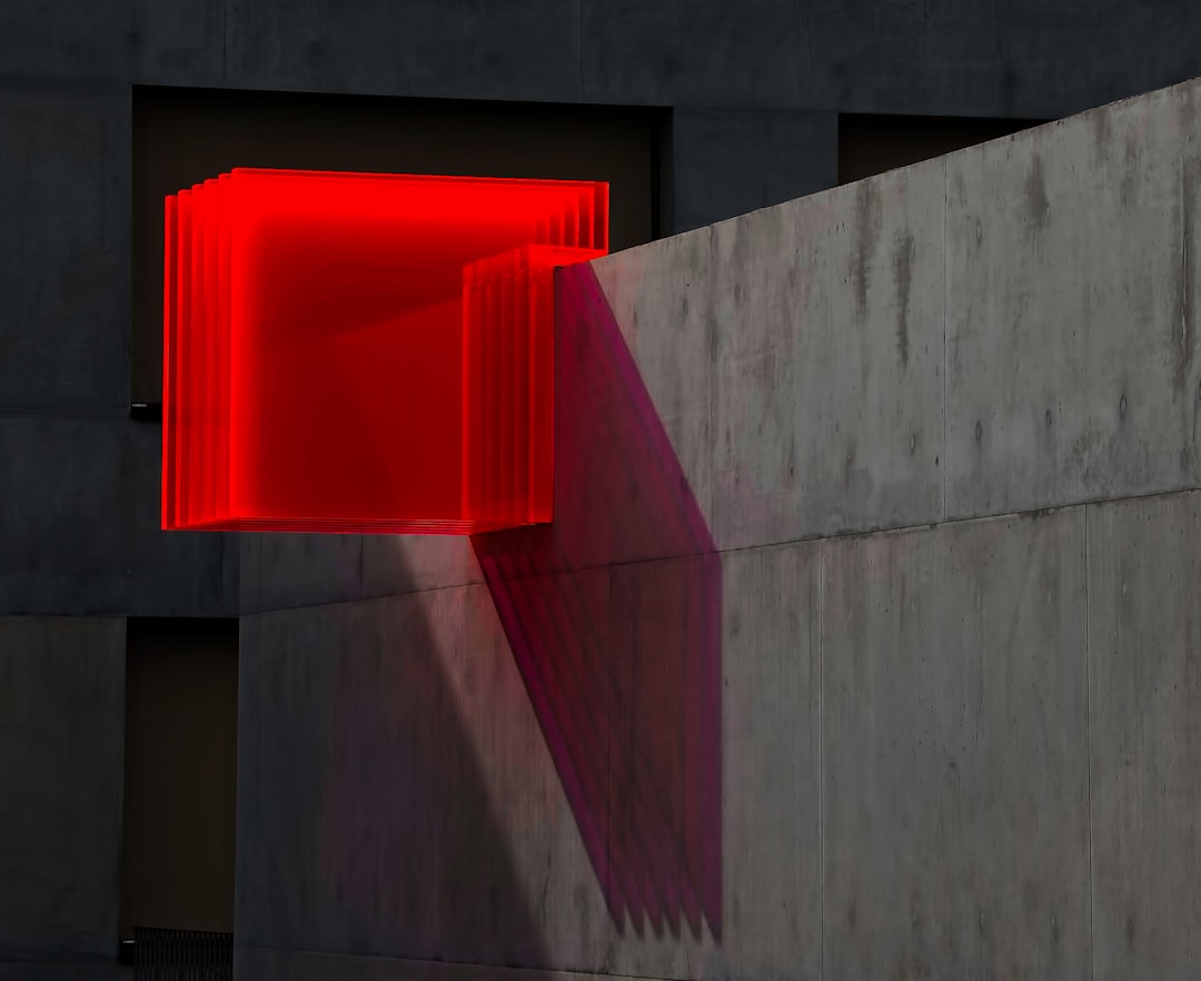 Red light therapy panel mounted on wall at home