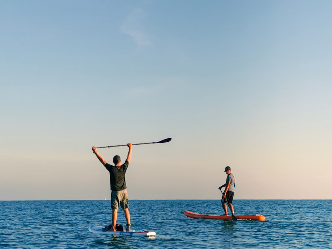 Stand up paddle board on water