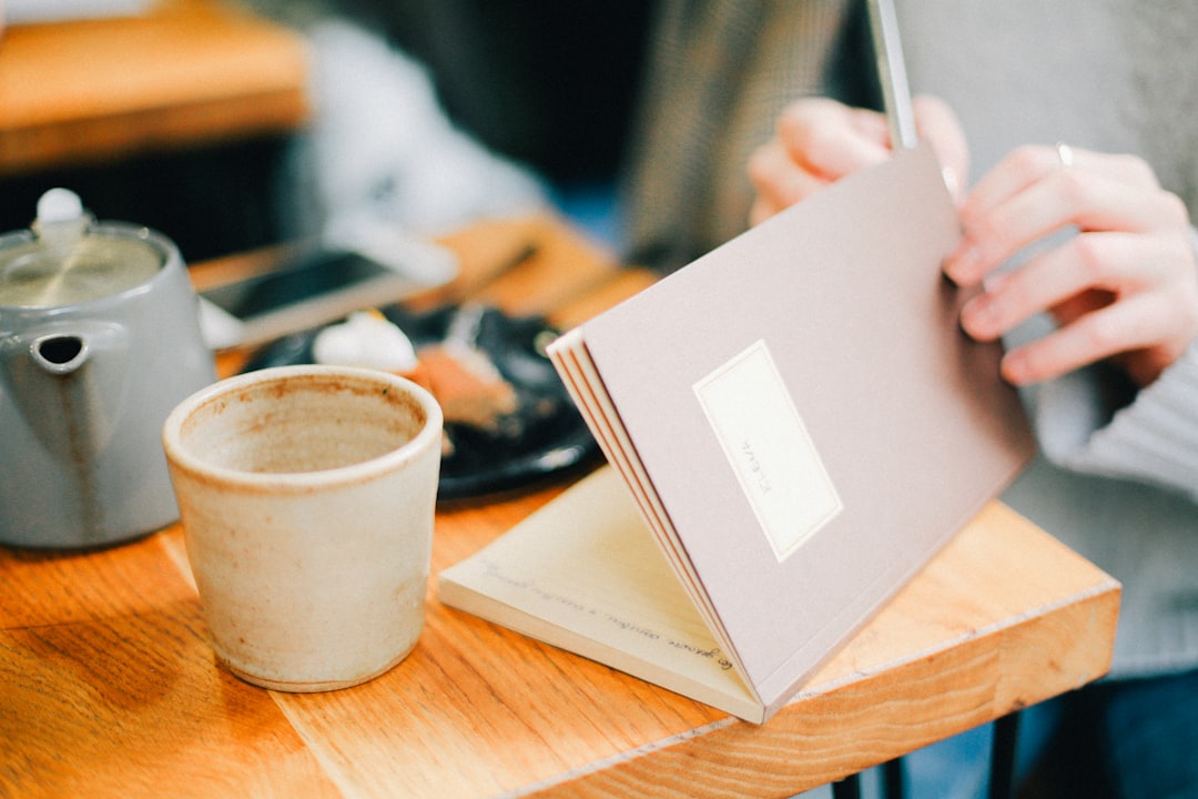 wellness journal and coffee on a kitchen counter