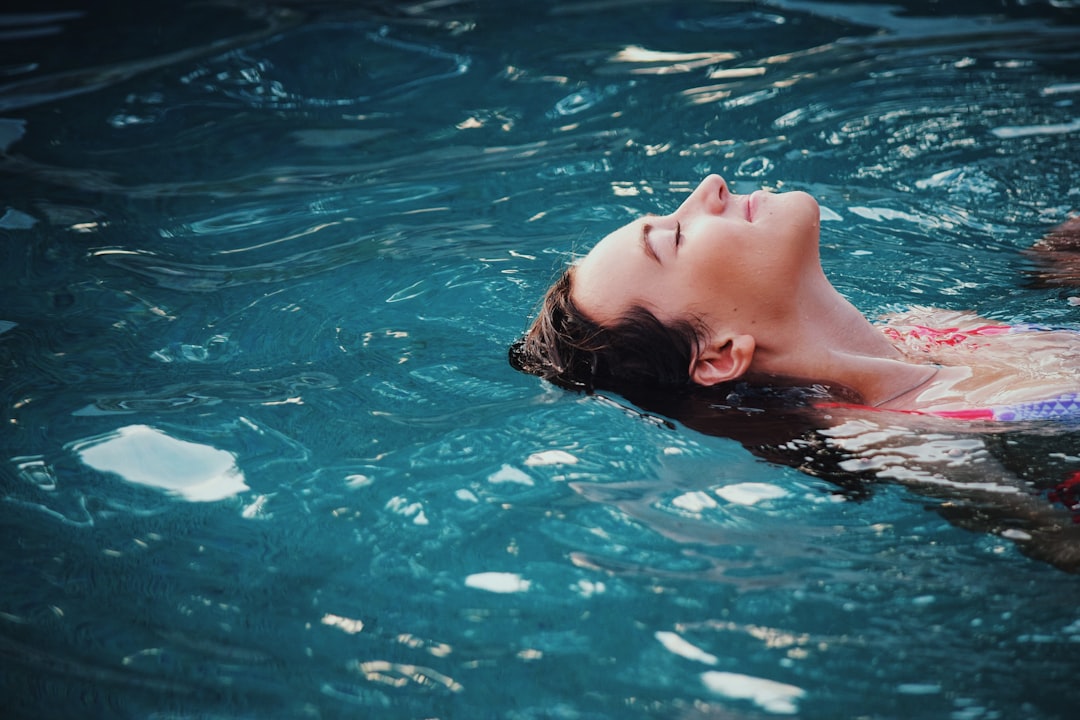 Woman experiencing cold water immersion therapy