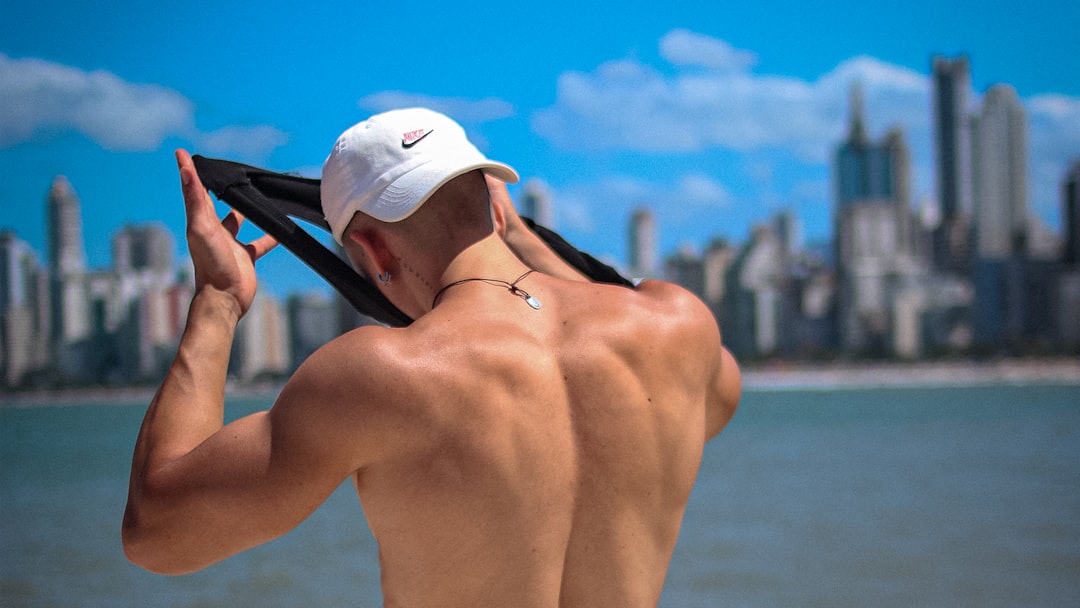 Athlete using cooling towel after workout gym