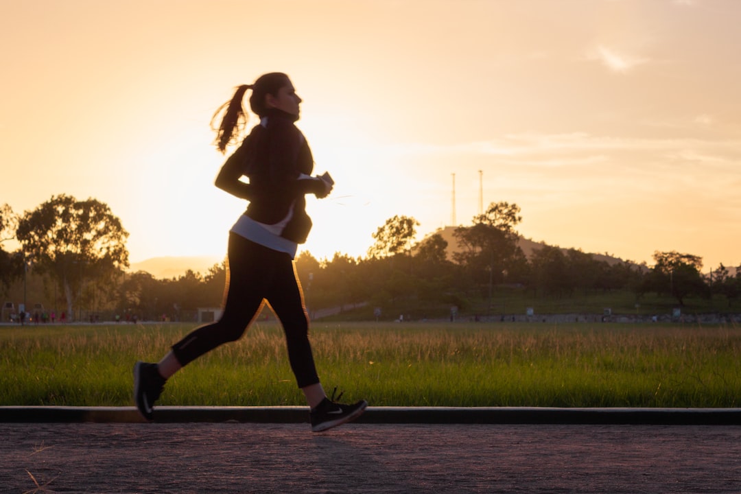 Woman running outdoors for fitness