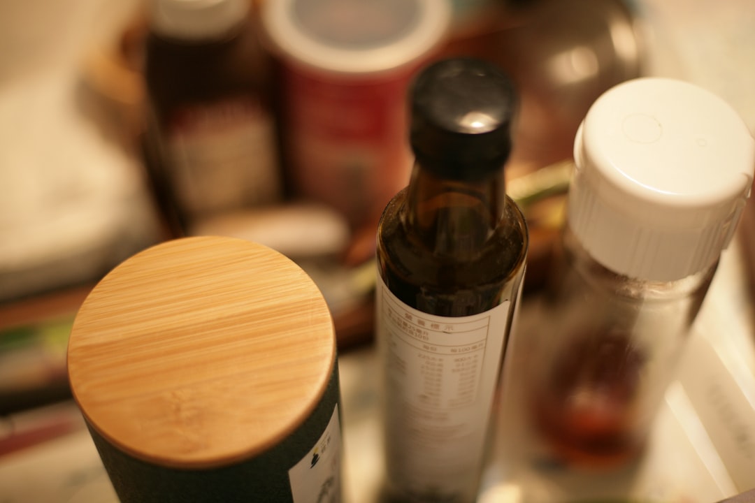 Supplement bottles organized neatly on a kitchen counter