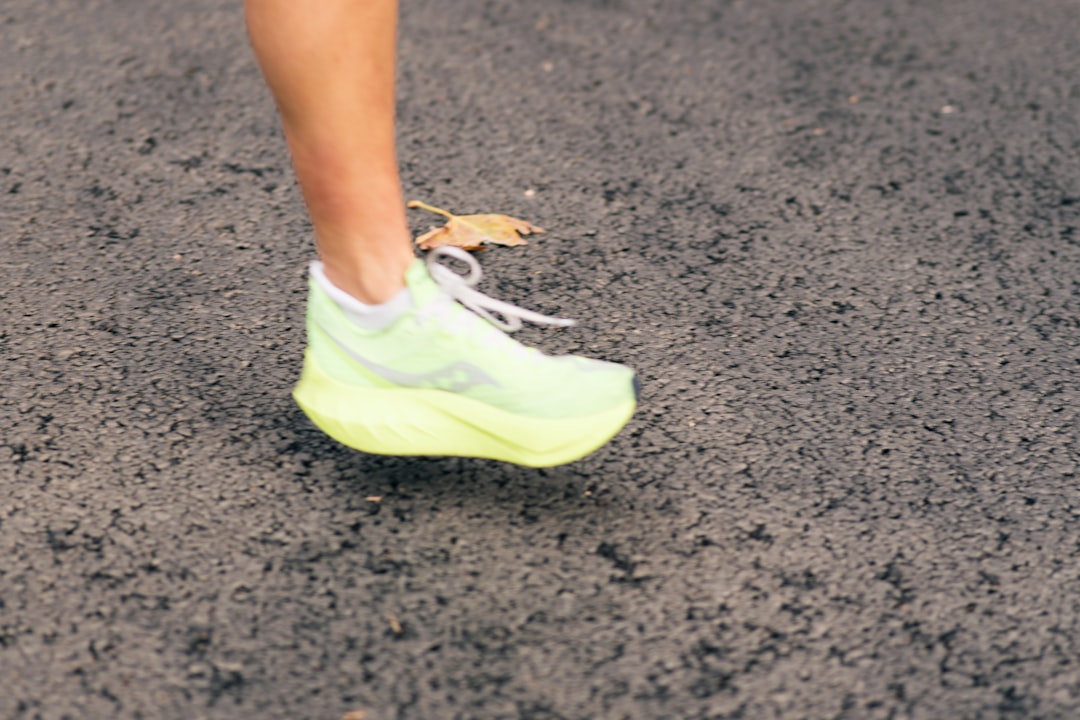 Woman running outdoors in athletic shoes