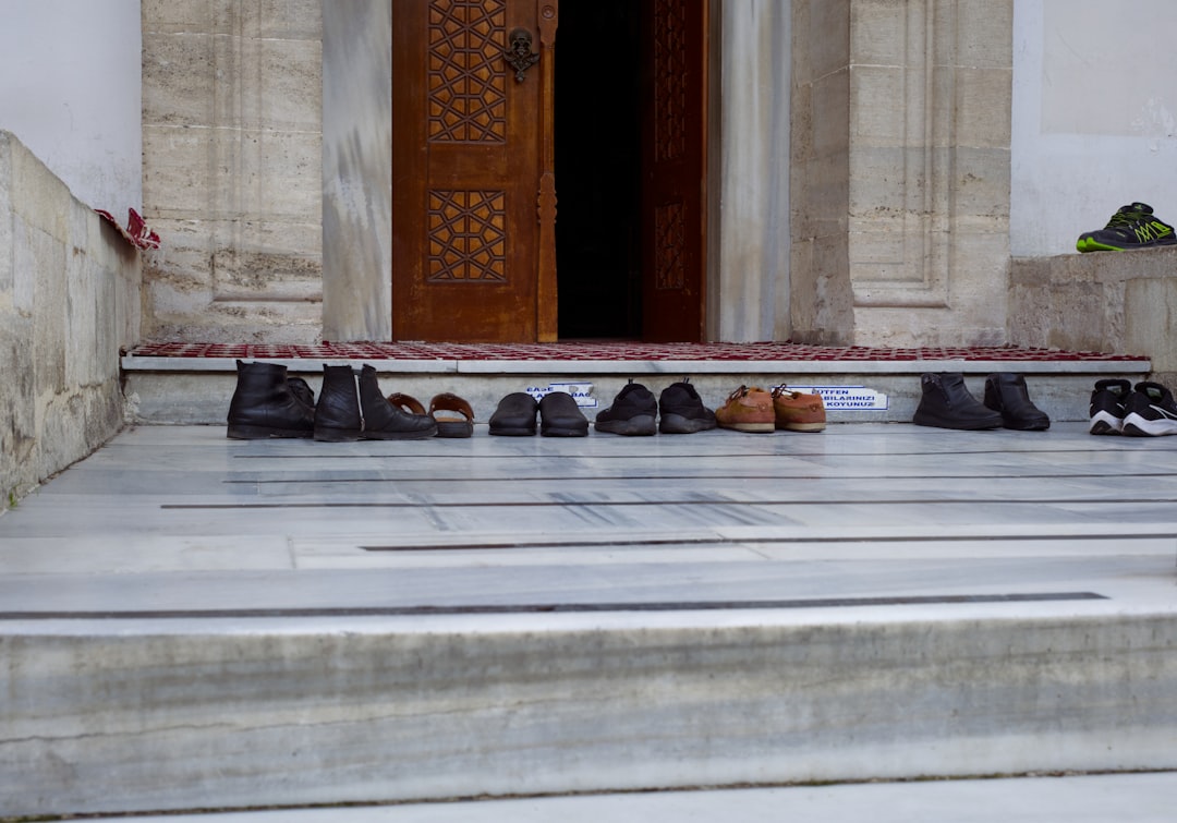 Running shoes ready by the door at dawn