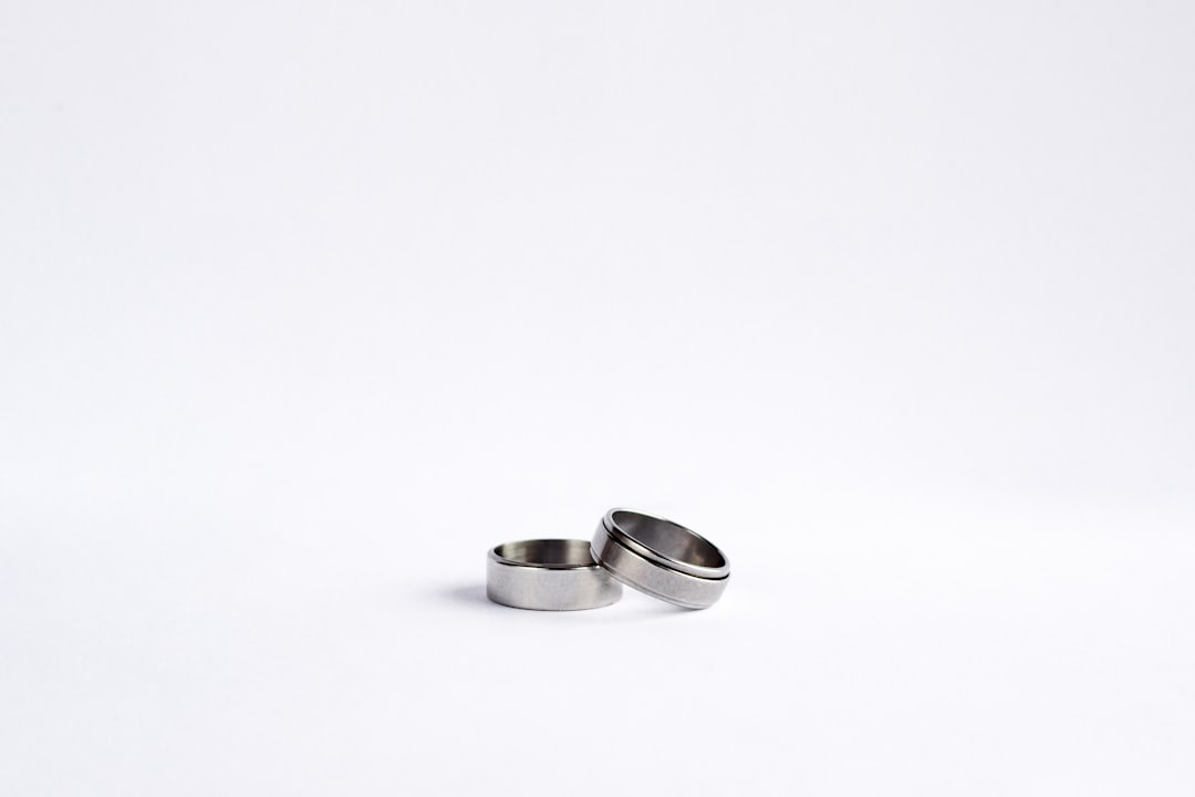 Minimal titanium ring design similar to premium smart rings