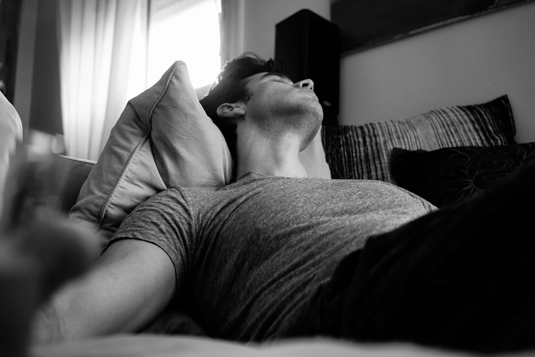 Athlete in bedroom recovery setup