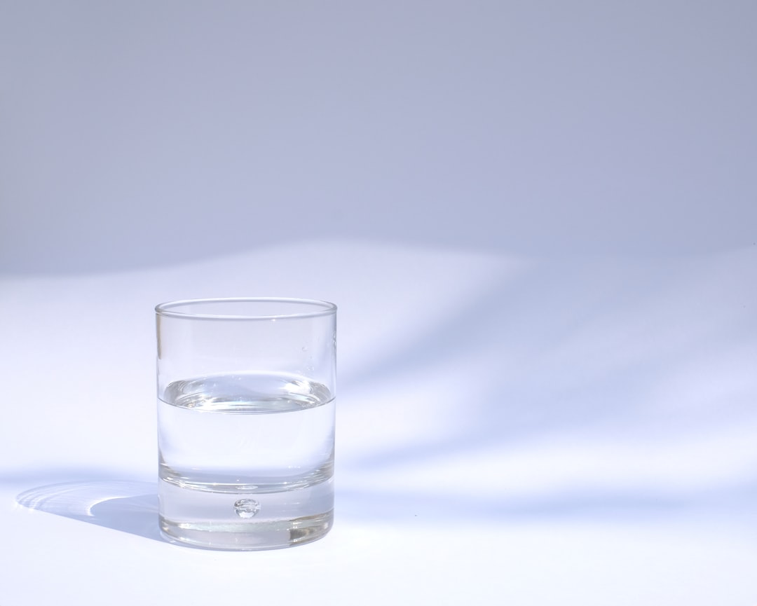 mixing supplement powder into a glass of water