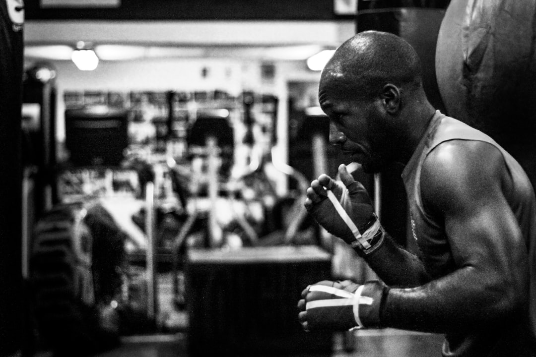 Athlete drinking a protein shake at the gym