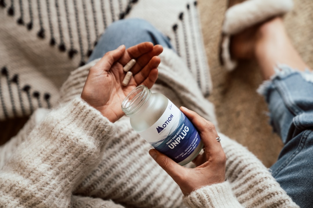 Probiotic supplement capsules arranged on a clean wellness-themed surface