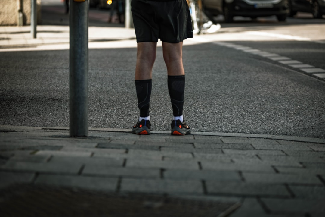 Close-up of compression socks on an athlete's calves