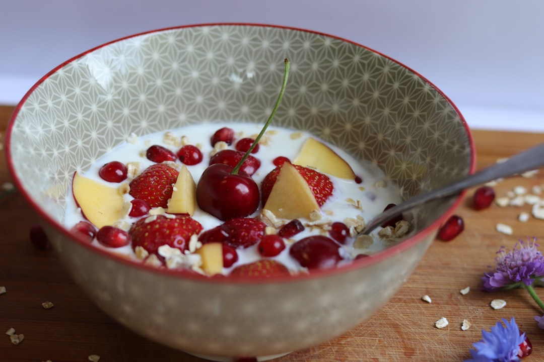 Oatmeal porridge bowl topped with fresh fruits