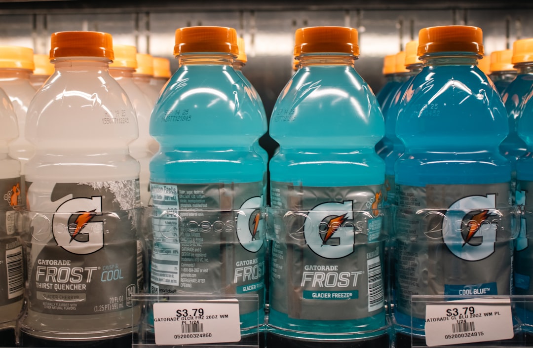 Electrolyte drink being poured into a glass for hydration
