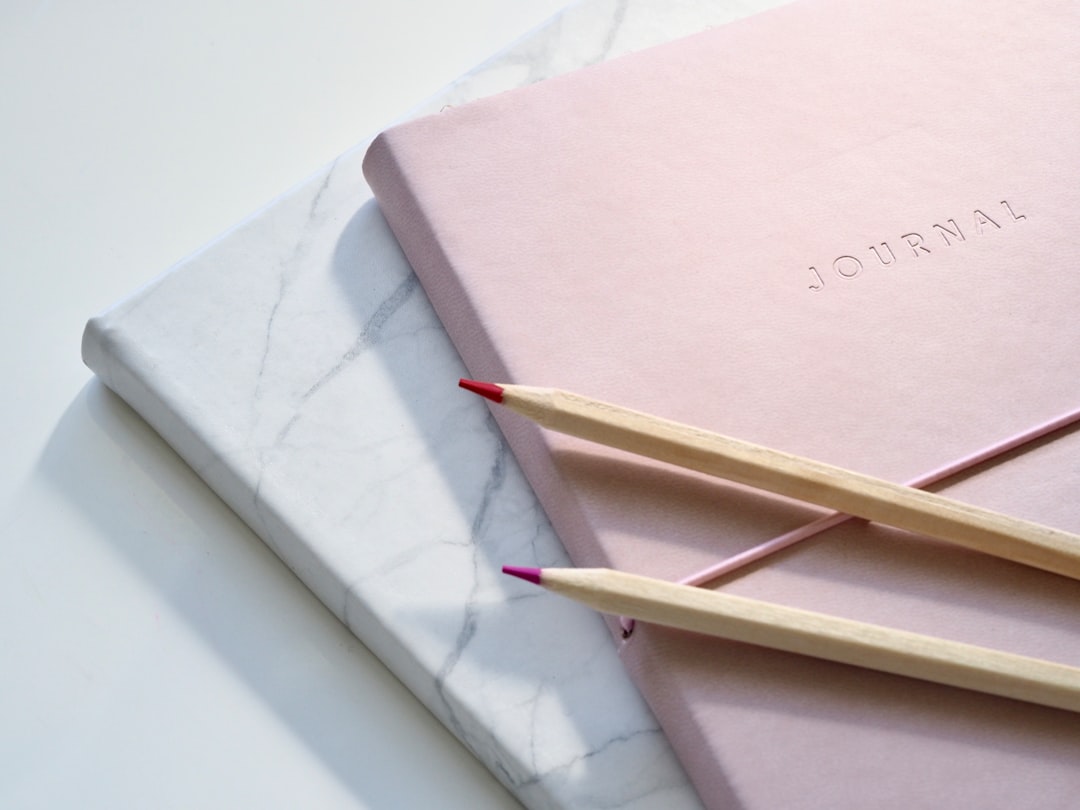 Wellness journal open on a desk with notes and planning pages