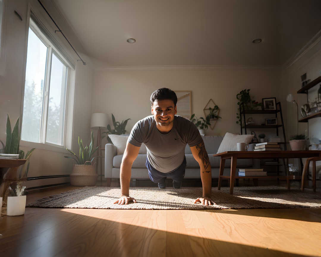Man doing push-ups on a rug in a bright living room