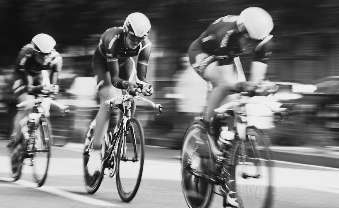 Cyclist driving hard during a time trial effort
