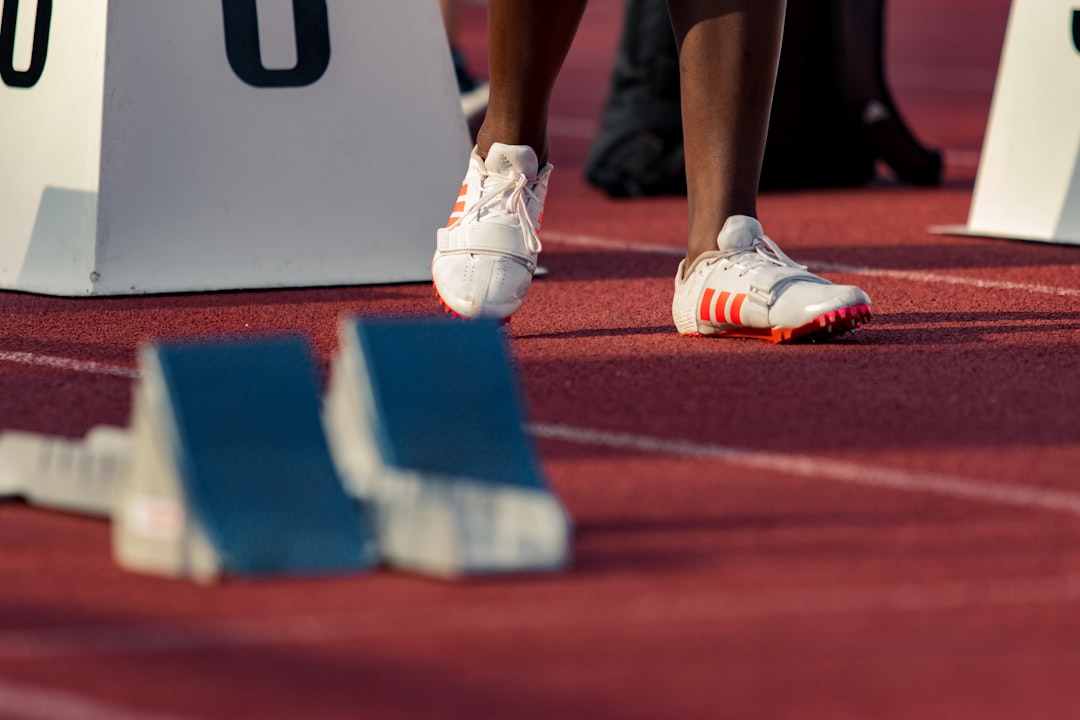 Female sprinter training on the track
