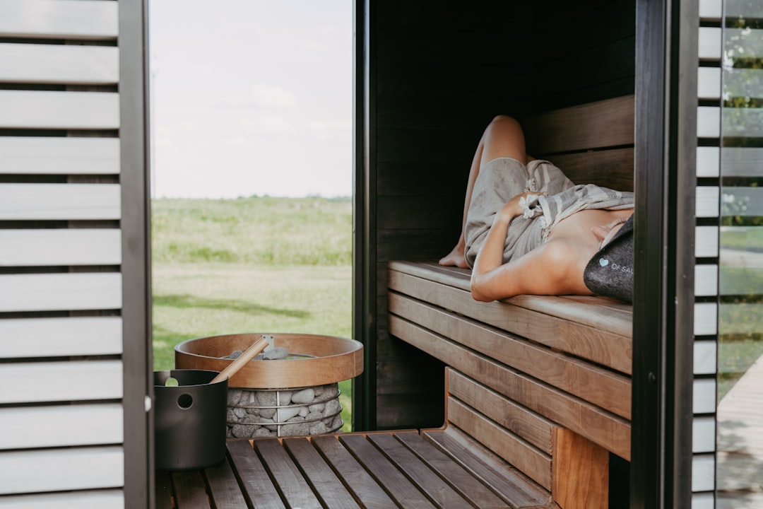 Woman relaxing during a heat therapy session at home