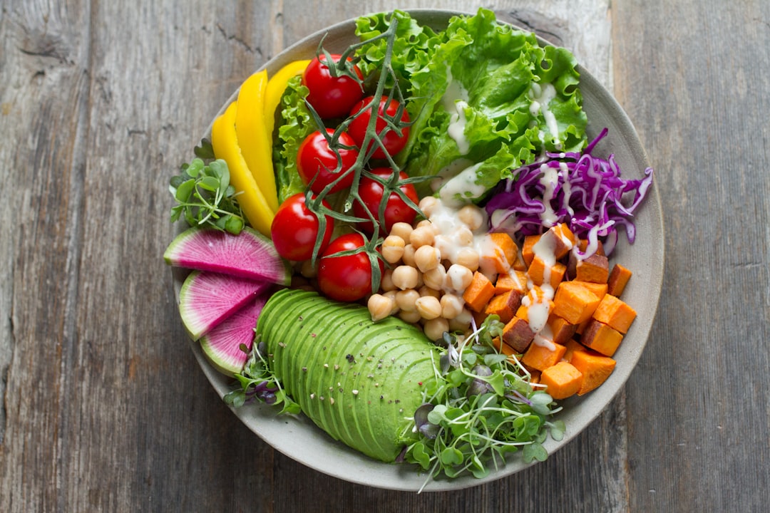 Colorful bowl of fresh vegetables and whole foods