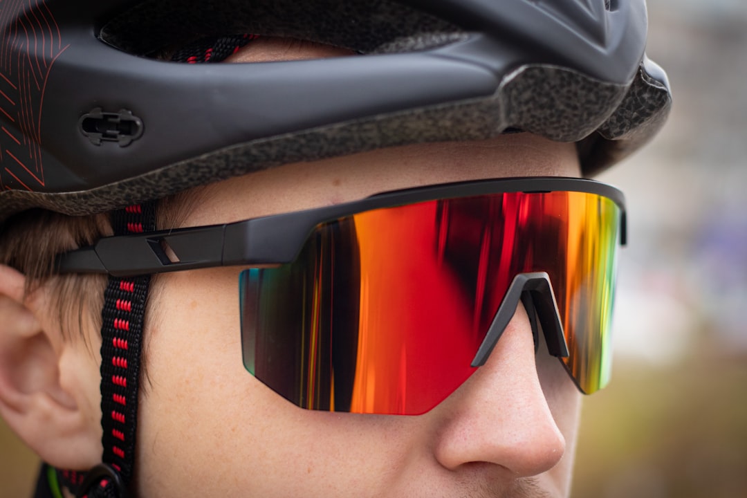 Athlete wearing wraparound sport sunglasses outdoors