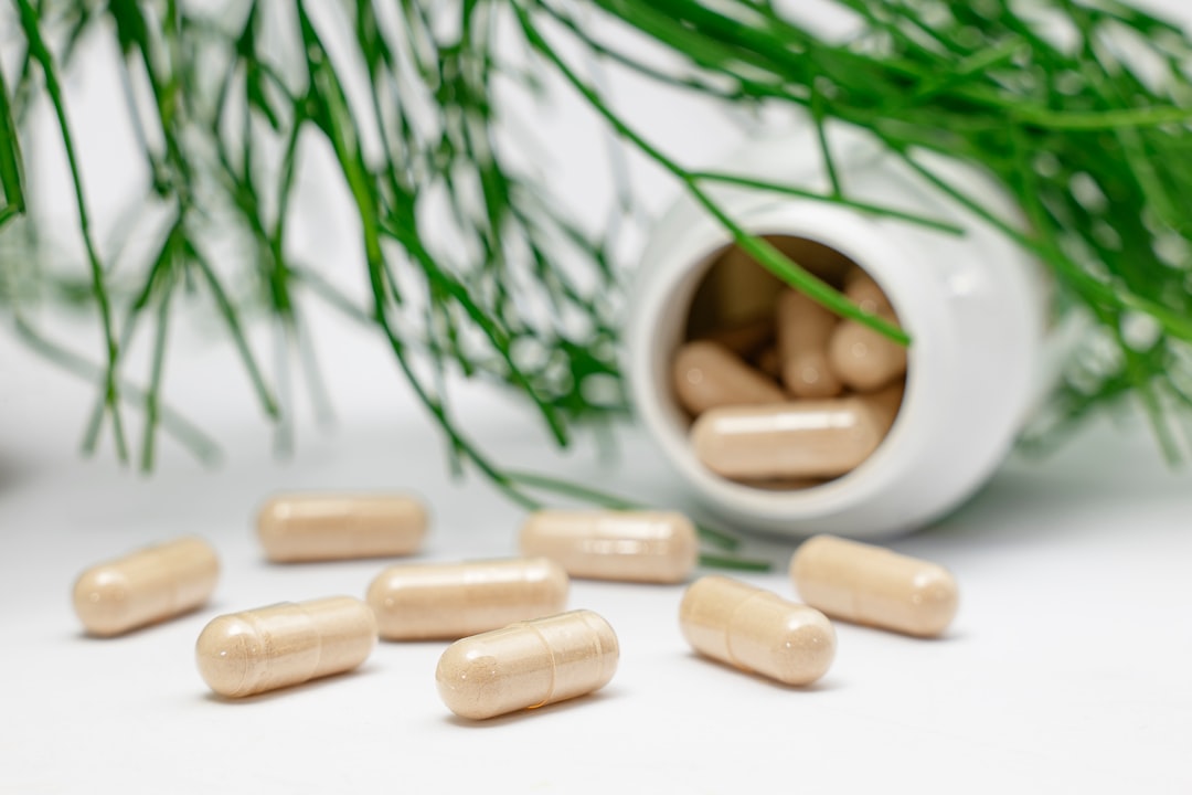 Joint support supplement capsules in a bottle with dosage information
