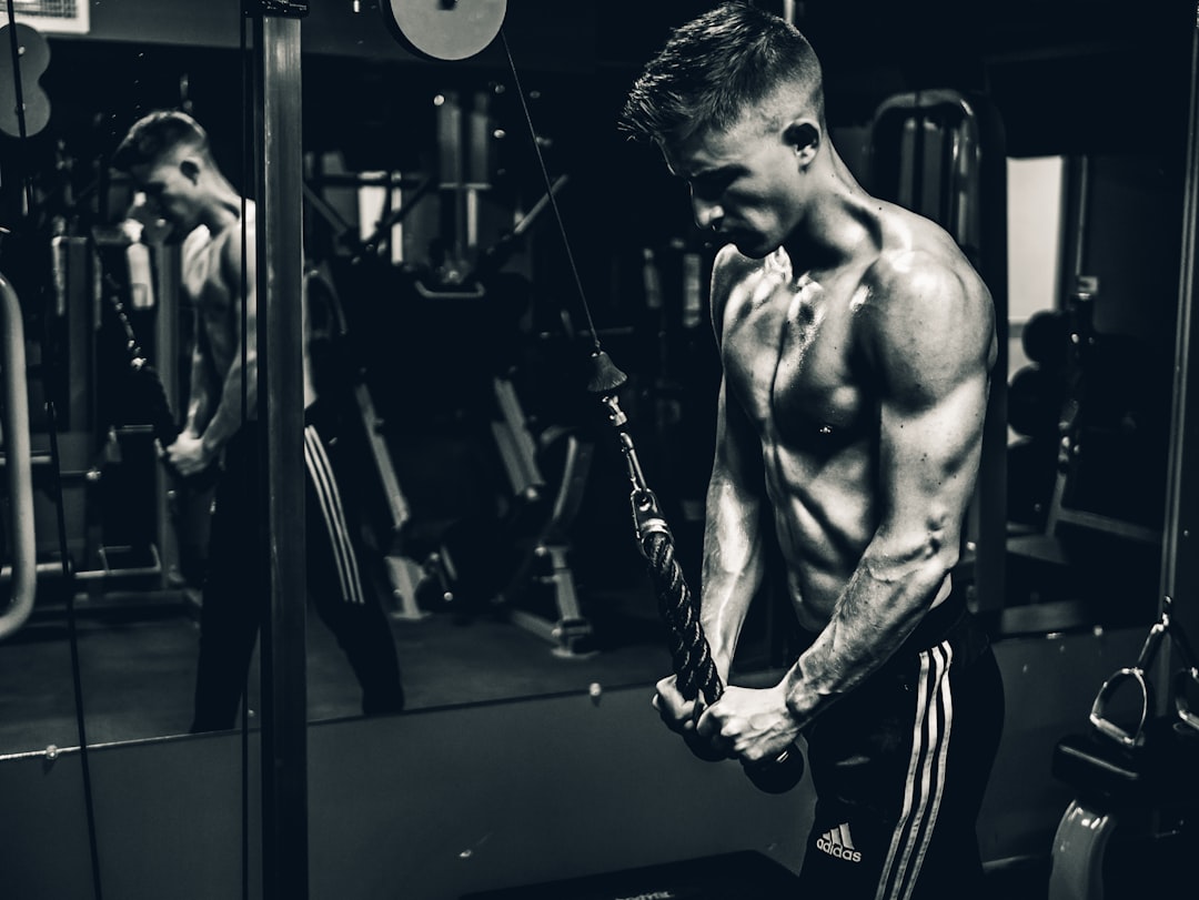 Cable workout exercise demonstration in gym