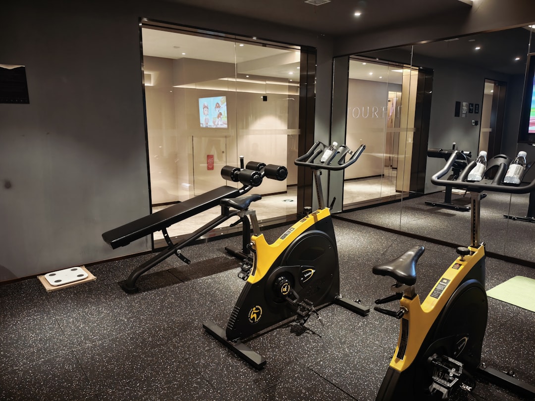 Adjustable weight bench for cable machine exercises