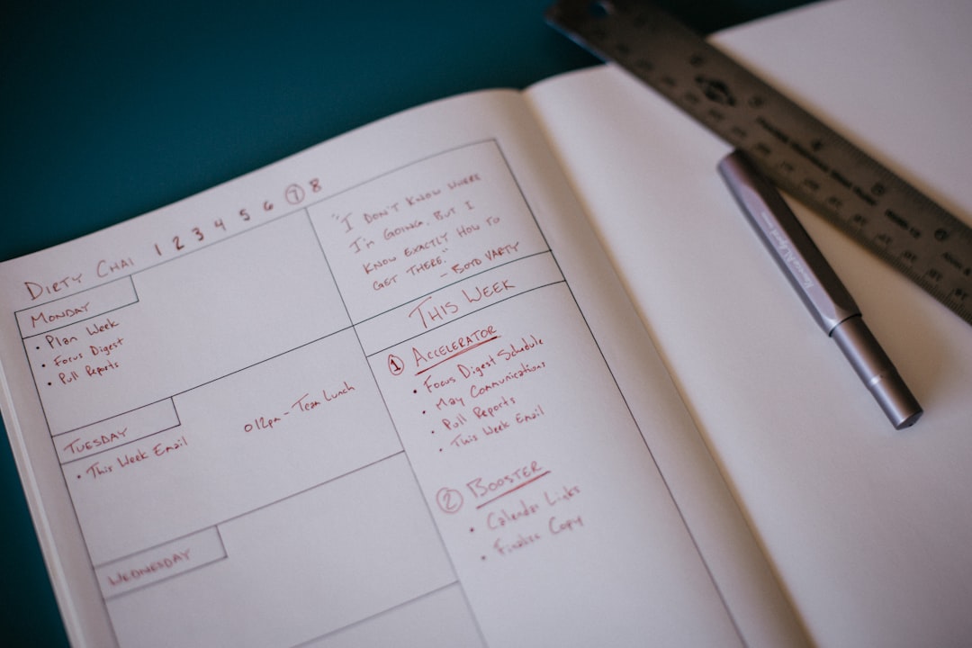 Open notebook and pen used for tracking daily health numbers at home