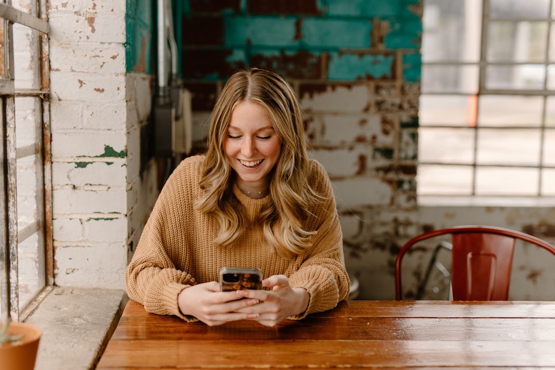 Woman reviewing health data on smartphone app