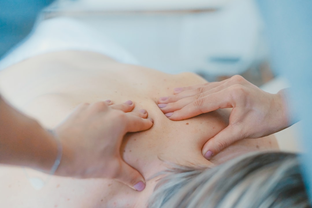 Deep tissue massage therapy targeting muscle knots and tension