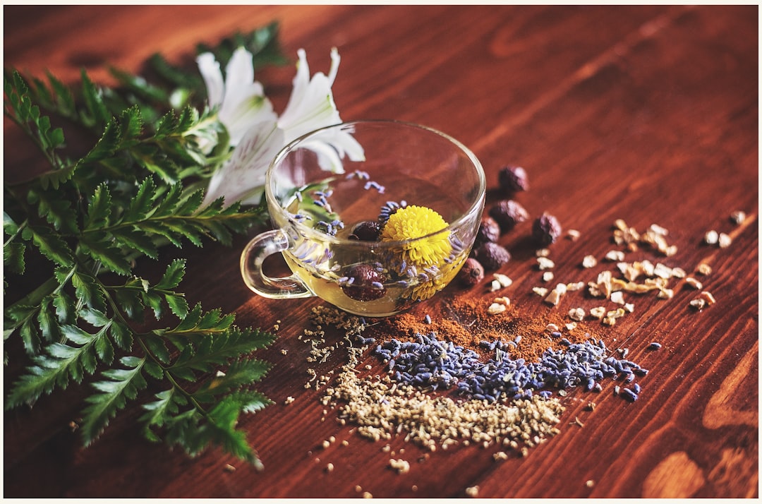 A warm mug of herbal tea glowing in evening light