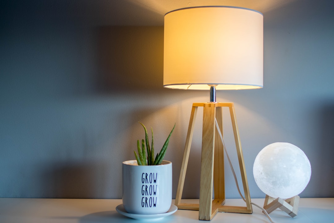 Bright light therapy lamp glowing on a desk