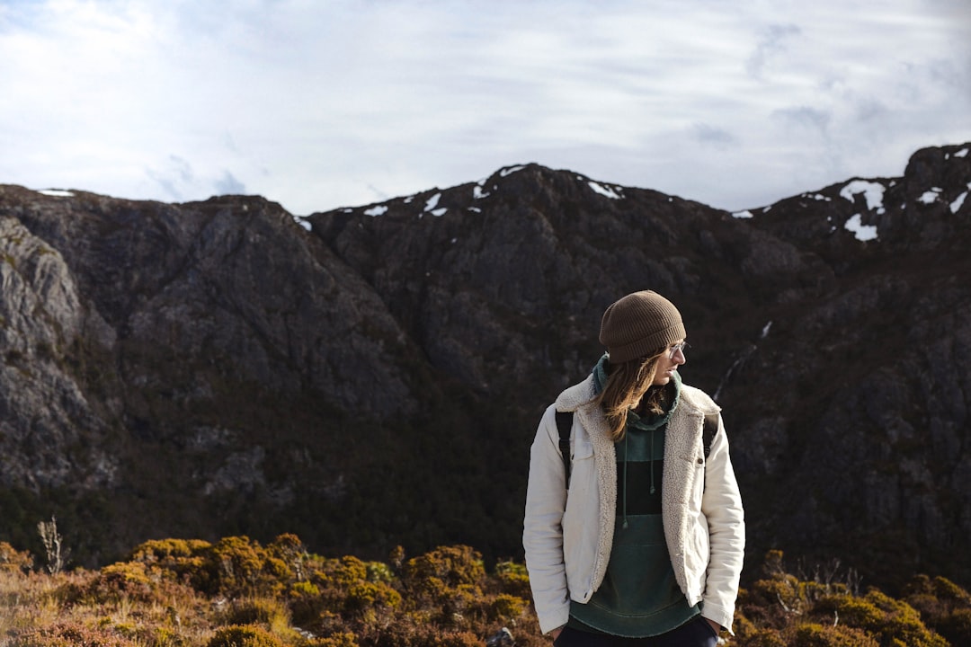 Hiker wearing fleece layer in mountains