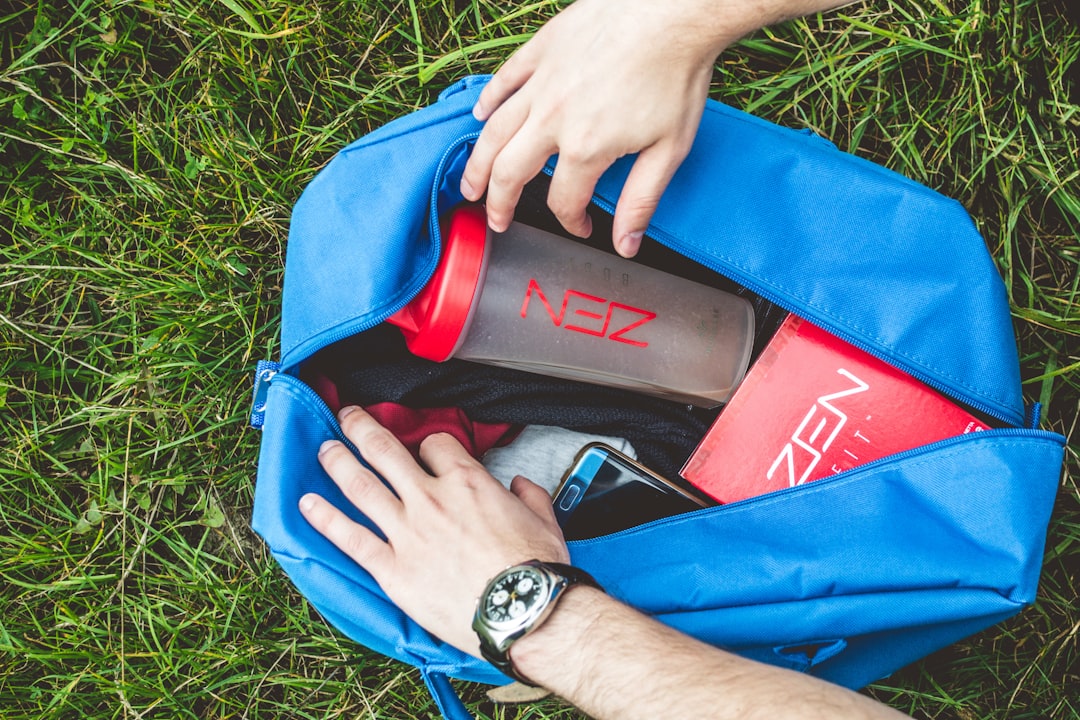 Gym bag with fitness accessories and recovery gear