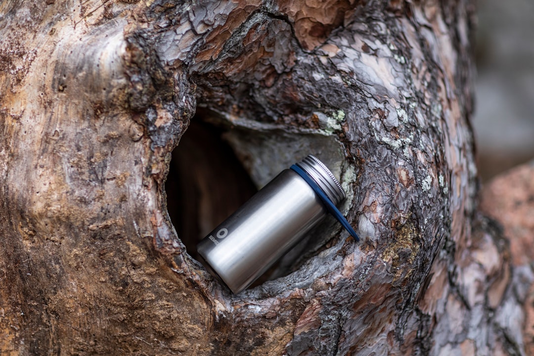 Water bottle carried along a hiking trail