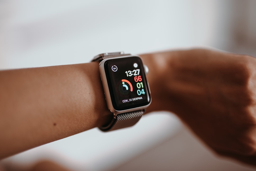 Smartwatch on a woman's wrist showing a health score
