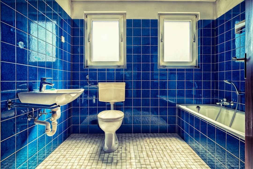 A clean, modern bathroom where a smart scale lives