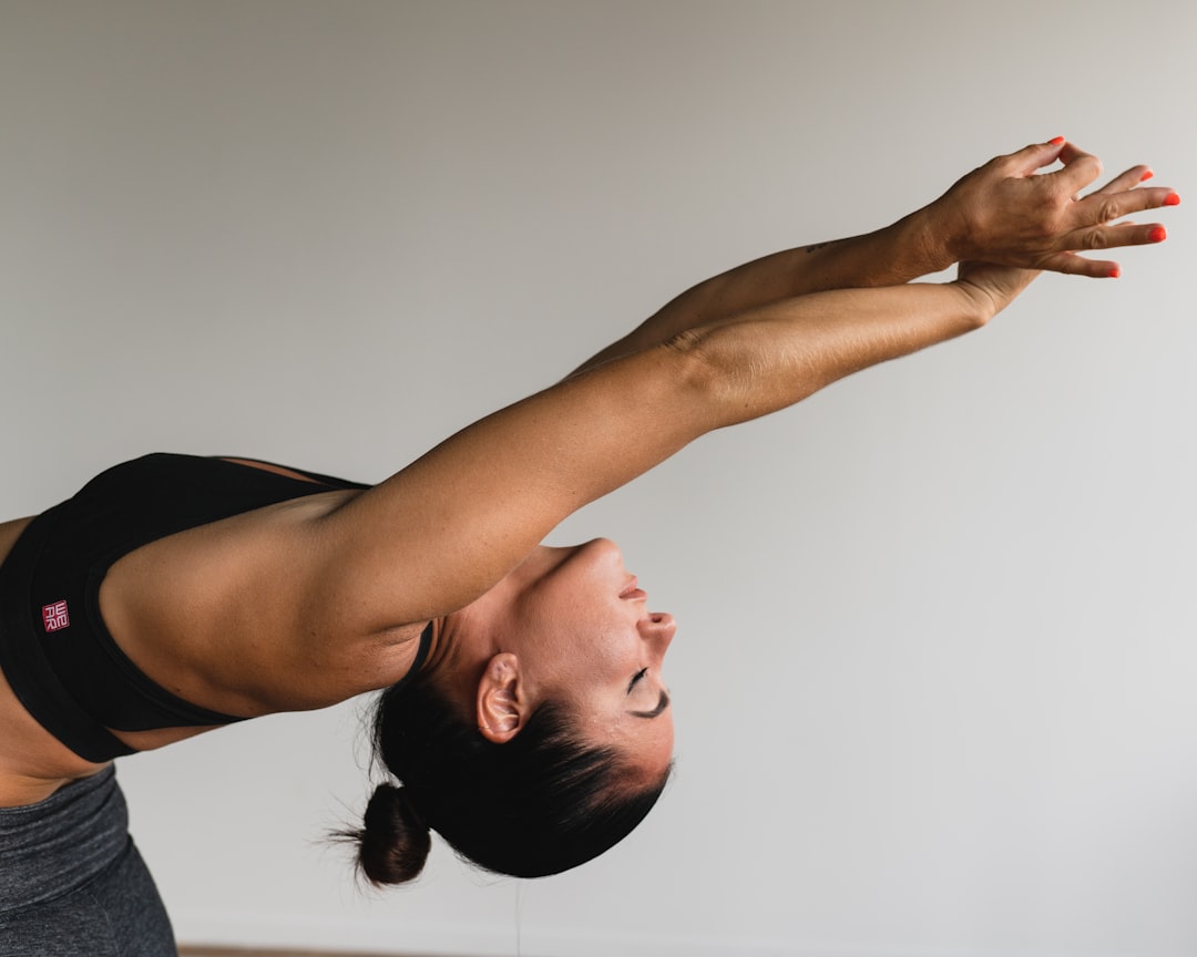 Woman stretching at home in the morning