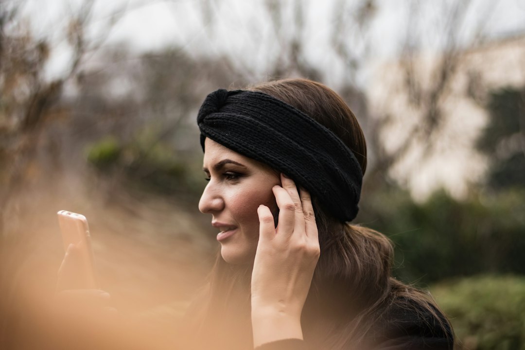 Woman wearing a fleece ear warmer headband outdoors